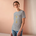 Woman wearing a gray soul and hands Feed the soul t-shirt with a graphic design on a beige background