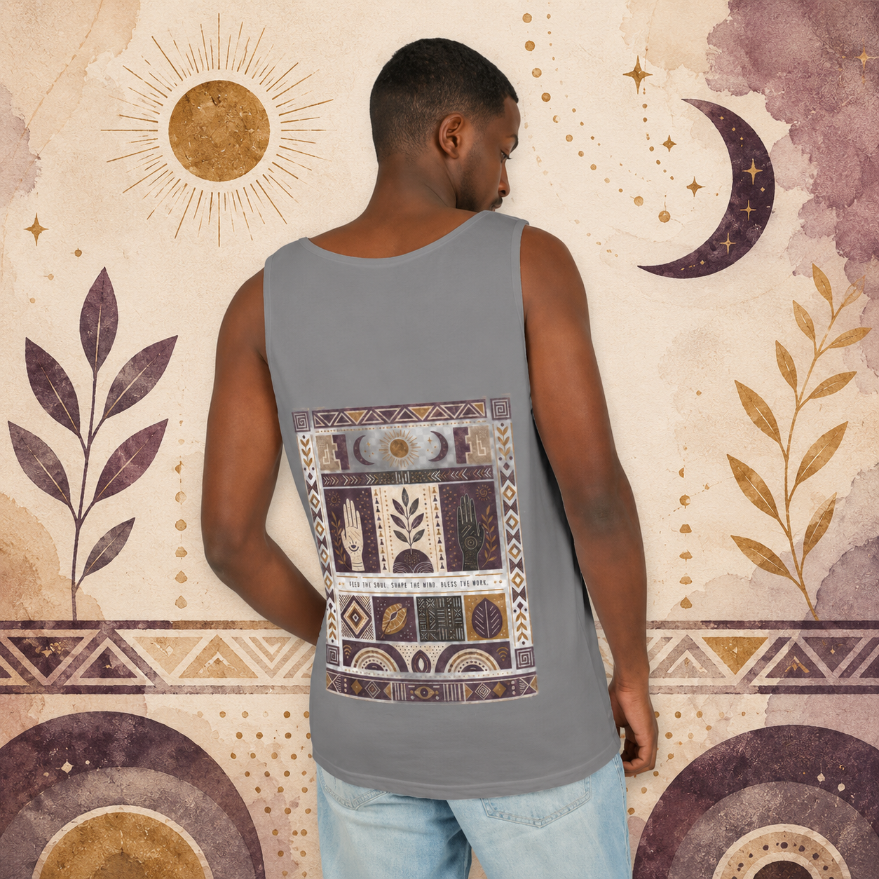 Back view of a man wearing a grey Soul & Hands tank top with an African-inspired celestial and botanical graphic.