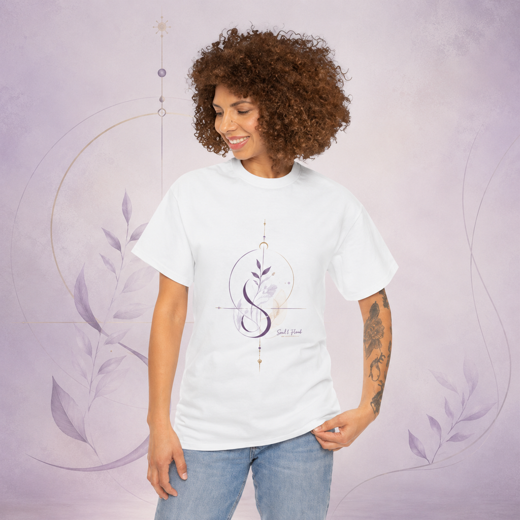 Woman wearing a white Soul & Hands T-shirt with a centered purple botanical infinity emblem on the front.